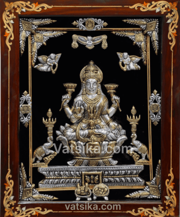 Lakshmi devi in antique silver photo frame